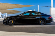 Load image into Gallery viewer, W219 CLS55 &amp; CLS63 AMG Carbon Fiber Side Skirt Extensions
